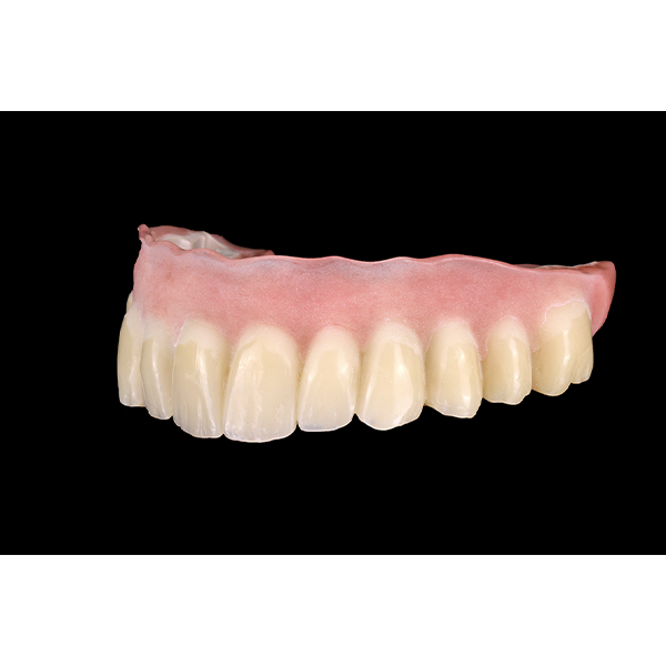 6. The base is then built up using a cold-curing polymer and sandblasted for individualization.